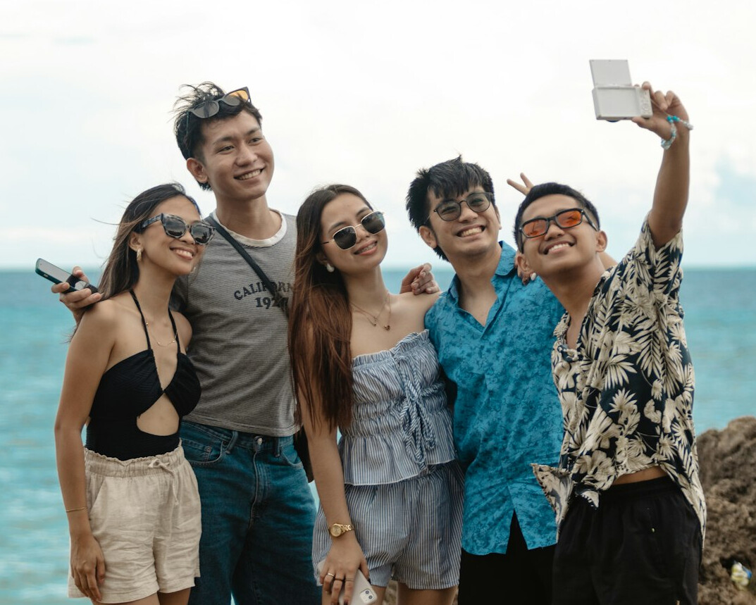 group of friends taking photos