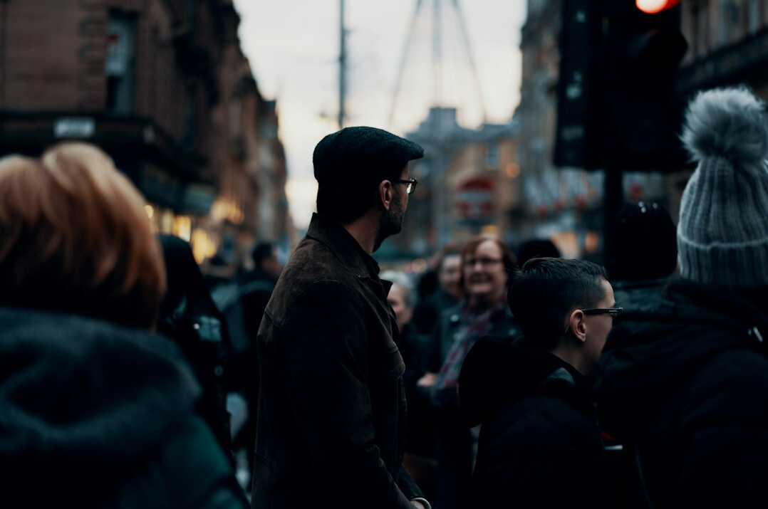 person standing out in crowd