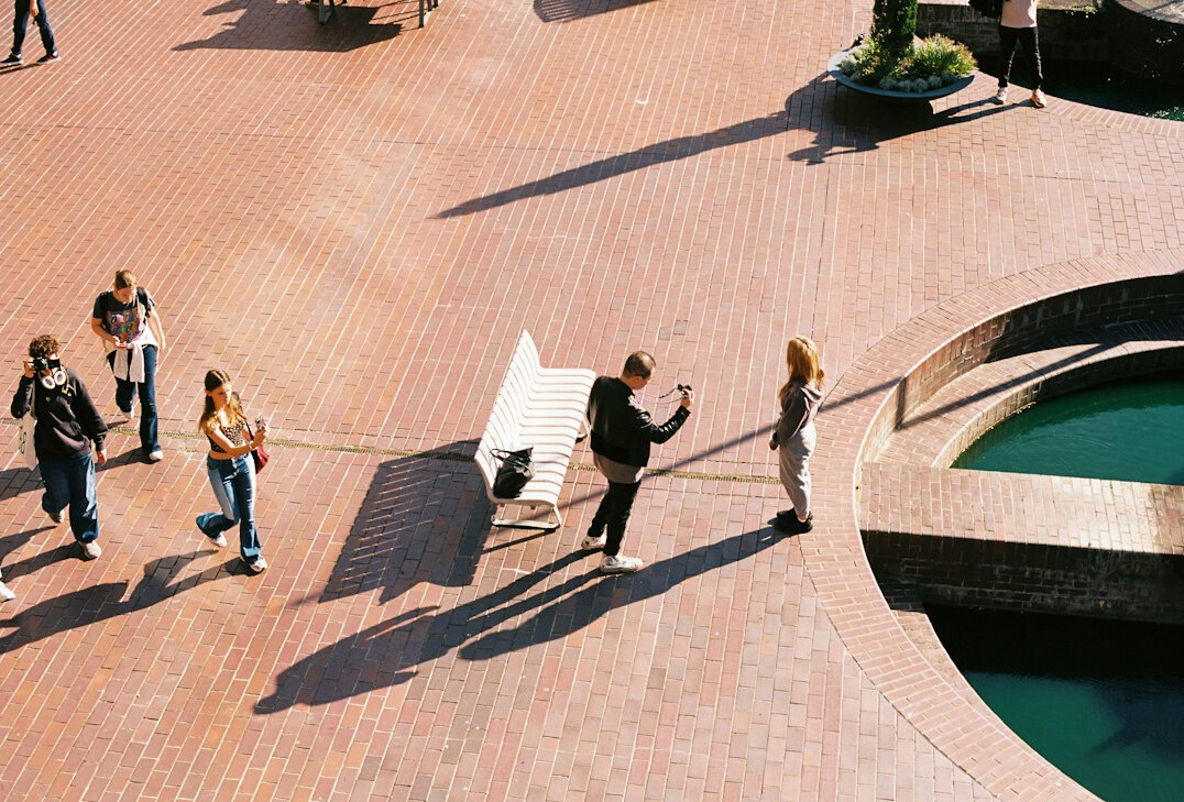 Distant view of a crowd of anonymous people from above in a public square